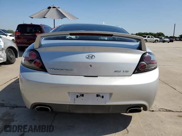2008 Hyundai Tiburon GT z VIN KMHHN66F98U267849, wystawiony jako Copart lot #88506815 z przebiegiem 92 820 mil mil oraz Szkoda całkowita • Salvage title. Historia ofert i sprzedaży dostępna na DreamBid. Obrazek 6.