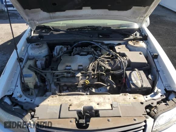 2002 Chevrolet Malibu LS z VIN 1G1NE52J22M681874, wystawiony jako Copart lot #87931005 z przebiegiem 18 664 mil mil oraz Szkoda całkowita • Salvage title. Historia ofert i sprzedaży dostępna na DreamBid. Obrazek 11.