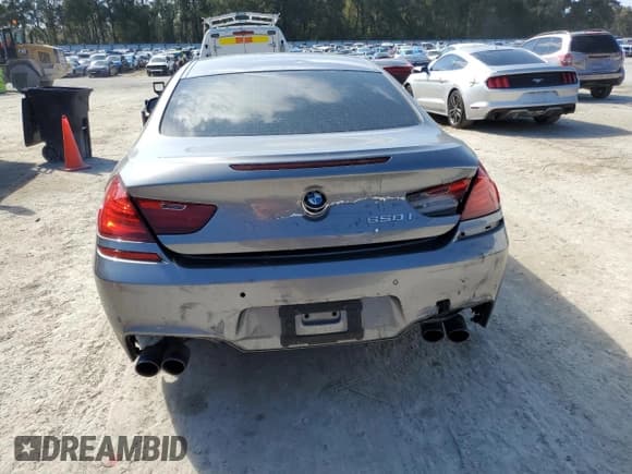 ✅ 2013 BMW 6 Series 650i • VIN: WBAYM9C57DDW20035 • Лот: 47051175. Опубликован ранее на Copart с пробегом 96 315 миль. Бесплатный доступ к архиву аукционных продаж из США и подробный отчёт об истории автомобиля на DreamBid. Изображение 6.