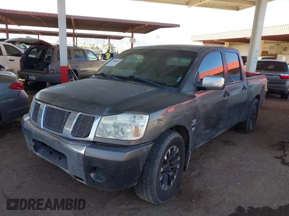 ✅ 2004 Nissan Titan XE • VIN: 1N6AA07A74N514580 • Lot: 40505884. Listed on IAAI with 289,699 mi. Free auction sales archive from the USA and detailed vehicle history report at DreamBid. Image 2.