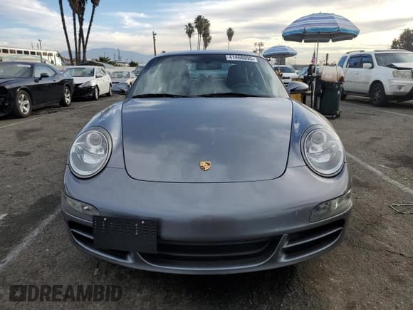 ✅ 2006 Porsche 911 • VIN: WP0AA29916S715607 • Лот: 41468095. Опубликован ранее на Copart с пробегом 48 305 миль. Бесплатный доступ к архиву аукционных продаж из США и подробный отчёт об истории автомобиля на DreamBid. Изображение 5.