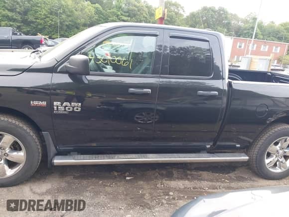2019 Ram 1500 Tradesman with VIN 1C6RR7FT3KS502698, listed as a IAAI auction lot 43010061 with 94,404 mi miles and . Bid and sale history available at DreamBid. Image 14.