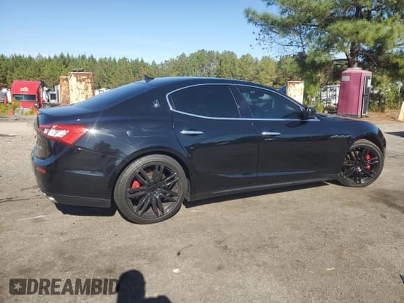 ✅ 2016 Maserati Ghibli S • VIN: ZAM57RSAXG1184410 • Lot: 92843185. Listed on Copart with 73,228 mi. Free auction sales archive from the USA and detailed vehicle history report at DreamBid. Image 3.