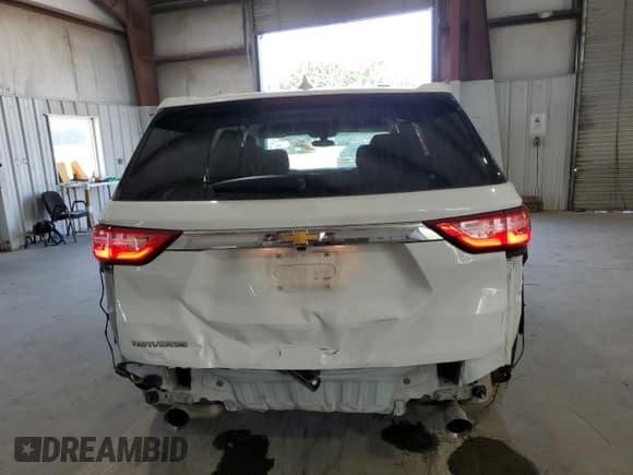 ✅ 2021 Chevrolet Traverse LS • VIN: 1GNERFKW6MJ179930 • Lot: 63435344. Wystawiony na Copart z przebiegiem 50 267 mil. Bezpłatny archiwum sprzedaży aukcyjnych z USA i szczegółowy raport historii pojazdu na DreamBid. Zdjęcie 6.