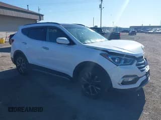 ✅ 2018 Hyundai Santa Fe Ultimate • VIN: 5NMZWDLA2JH105416 • Lot: 43062661. Listed on IAAI with 67,574 mi. Free auction sales archive from the USA and detailed vehicle history report at DreamBid. Image 1.
