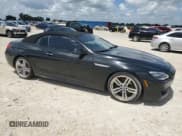 ✅ 2018 BMW 6 Series 650i • VIN: WBA6F5C5XJD997058 • Lot: 70083514. Wystawiony na Copart z przebiegiem Nie podano. Bezpłatny archiwum sprzedaży aukcyjnych z USA i szczegółowy raport historii pojazdu na DreamBid. Zdjęcie 4.