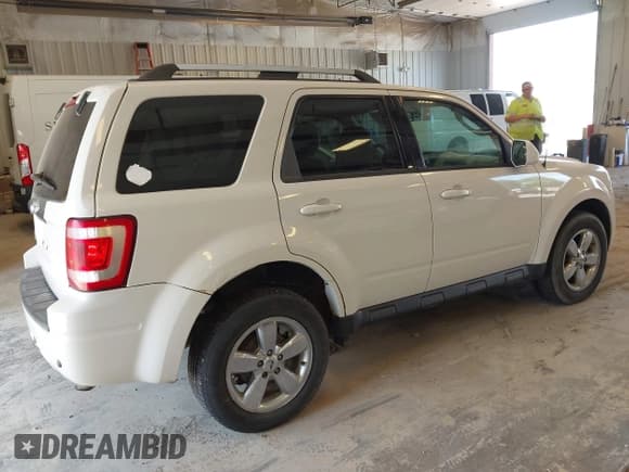 ✅ 2009 Ford Escape Limited • VIN: 1FMCU04729KA02595 • Lot: 42957550. Listed on IAAI with 156,567 mi. Free auction sales archive from the USA and detailed vehicle history report at DreamBid. Image 4.