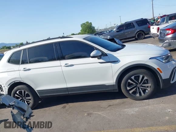 ✅ 2023 Volkswagen Tiguan S • VIN: 3VVRB7AX3PM065181 • Lot: 42419081. Listed on IAAI with 32,495 mi. Free auction sales archive from the USA and detailed vehicle history report at DreamBid. Image 14.