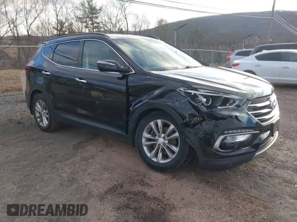 2017 Hyundai Santa Fe 2.0T z VIN 5XYZUDLA8HG502333, wystawiony jako IAAI lot #41246195 z przebiegiem 62 772 mil mil oraz . Historia ofert i sprzedaży dostępna na DreamBid. Obrazek 1.