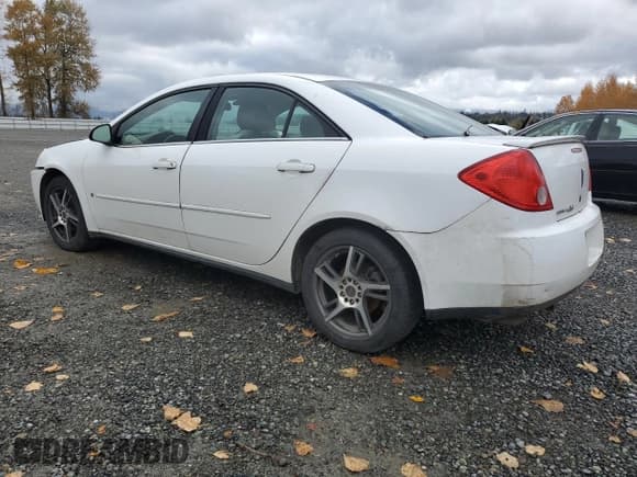 ✅ 2009 Pontiac G6 1SA • VIN: 1G2ZG57B594186734 • Lot: 90953235. Listed on Copart with 168,398 mi. Free auction sales archive from the USA and detailed vehicle history report at DreamBid. Image 2.