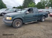 ✅ 2001 Ford F-150 XL • VIN: 1FTRX17L41NA90489 • Lot: 67060015. Listed on Copart with 143,360 mi. Free auction sales archive from the USA and detailed vehicle history report at DreamBid. Image 1.