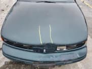 ✅ 1996 Oldsmobile Cutlass Supreme S • VIN: 1G3WH12M4TF340519 • Lot: 79650534. Listed on Copart with 335,682 mi. Free auction sales archive from the USA and detailed vehicle history report at DreamBid. Image 11.