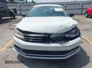 ✅ 2015 Volkswagen Jetta SE • VIN: 3VWD17AJ3FM354676 • Lot: 42324721. Listed on IAAI with 122,763 mi. Free auction sales archive from the USA and detailed vehicle history report at DreamBid. Image 12.