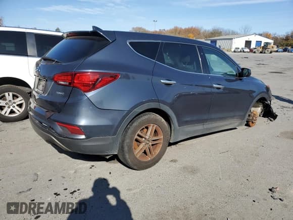 ✅ 2017 Hyundai Santa Fe 2.4L • VIN: 5NMZT3LB8HH047057 • Лот: 75594893. Опубликован ранее на Copart с пробегом 224 532 миль. Бесплатный доступ к архиву аукционных продаж из США и подробный отчёт об истории автомобиля на DreamBid. Изображение 3.