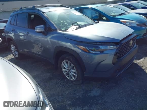 ✅ 2023 Toyota Corolla Cross LE • VIN: 7MUBAABG8PV045934 • Lot: 41593101. Listed on IAAI with 11,378 mi. Free auction sales archive from the USA and detailed vehicle history report at DreamBid. Image 1.