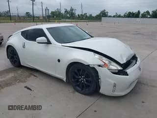✅ 2016 Nissan 370Z • VIN: JN1AZ4EH8GM932159 • Lot: 42211310. Listed on IAAI with 96,463 mi. Free auction sales archive from the USA and detailed vehicle history report at DreamBid. Image 1.