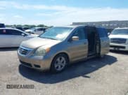 ✅ 2010 Honda Odyssey Touring • VIN: 5FNRL3H93AB069531 • Lot: 42462835. Listed on IAAI with 241,297 mi. Free auction sales archive from the USA and detailed vehicle history report at DreamBid. Image 2.