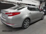 ✅ 2013 Kia Optima SX • VIN: 5XXGR4A6XDG106748 • Lot: 43325773. Listed on IAAI with 67,913 mi. Free auction sales archive from the USA and detailed vehicle history report at DreamBid. Image 4.