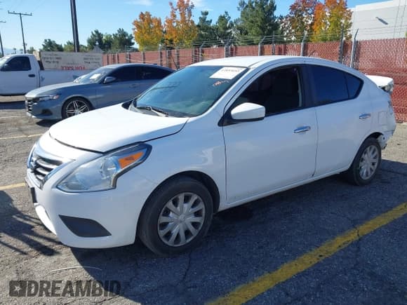 ✅ 2018 Nissan Versa SV • VIN: 3N1CN7AP2JL802219 • Lot: 43853053. Listed on IAAI with 120,601 mi. Free auction sales archive from the USA and detailed vehicle history report at DreamBid. Image 2.