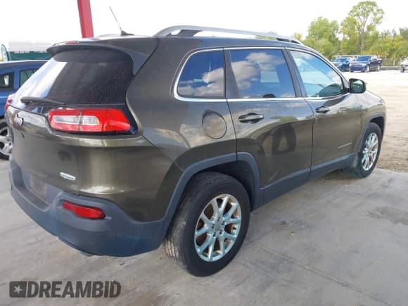 ✅ 2015 Jeep Cherokee Latitude • VIN: 1C4PJMCS8FW559172 • Lot: 43681804. Listed on IAAI with 35,998 mi. Free auction sales archive from the USA and detailed vehicle history report at DreamBid. Image 4.