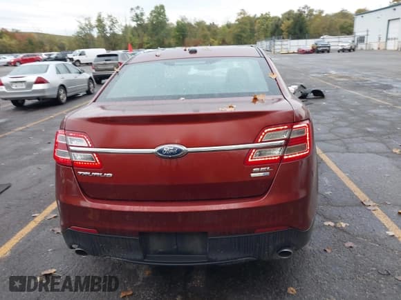 ✅ 2014 Ford Taurus SEL • VIN: 1FAHP2H8XEG138900 • Lot: 43458227. Listed on IAAI with 109,233 mi. Free auction sales archive from the USA and detailed vehicle history report at DreamBid. Image 16.