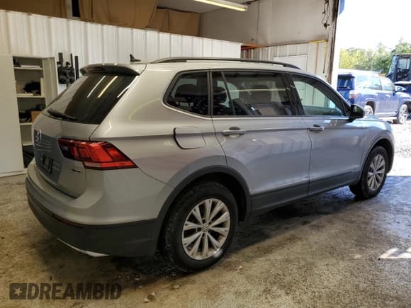 ✅ 2020 Volkswagen Tiguan S • VIN: 3VV0B7AX8LM113955 • Lot: 84452755. Listed on Copart with 30,970 mi. Free auction sales archive from the USA and detailed vehicle history report at DreamBid. Image 3.