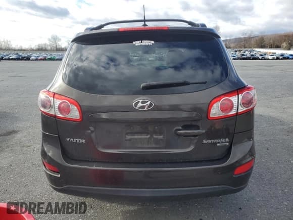 ✅ 2011 Hyundai Santa Fe SE • VIN: 5XYZHDAG1BG076522 • Lot: 87142914. Listed on Copart with 181,777 mi. Free auction sales archive from the USA and detailed vehicle history report at DreamBid. Image 6.