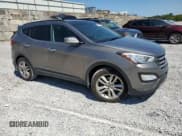 ✅ 2015 Hyundai Santa Fe • VIN: 5XYZW4LAXFG239754 • Lot: 71499665. Listed on Copart with 75,339 mi. Free auction sales archive from the USA and detailed vehicle history report at DreamBid. Image 4.