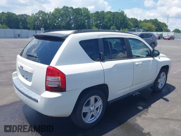 ✅ 2010 Jeep Compass Sport • VIN: 1J4NT4FB7AD503235 • Лот: 42633289. Опубликован ранее на IAAI с пробегом 159 629 миль. Бесплатный доступ к архиву аукционных продаж из США и подробный отчёт об истории автомобиля на DreamBid. Изображение 4.