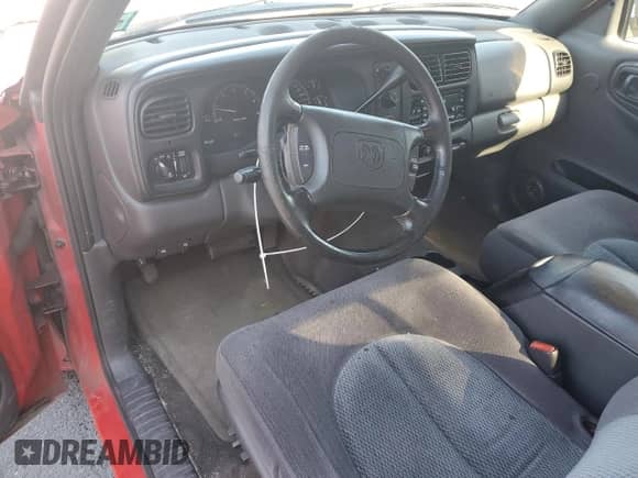 1999 Dodge Dakota Sport z VIN 1B7GL22Z4XS276158, wystawiony jako Copart lot #76972714 z przebiegiem 159 628 mil mil oraz Szkoda całkowita • Salvage title. Historia ofert i sprzedaży dostępna na DreamBid. Obrazek 8.