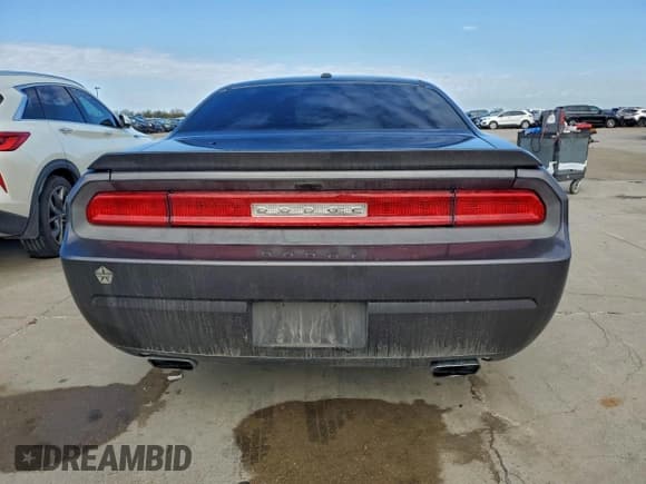 ✅ 2013 Dodge Challenger SXT • VIN: 2C3CDYAG8DH512011 • Lot: 93937345. Wystawiony na Copart z przebiegiem 125 451 mil. Bezpłatny archiwum sprzedaży aukcyjnych z USA i szczegółowy raport historii pojazdu na DreamBid. Zdjęcie 6.