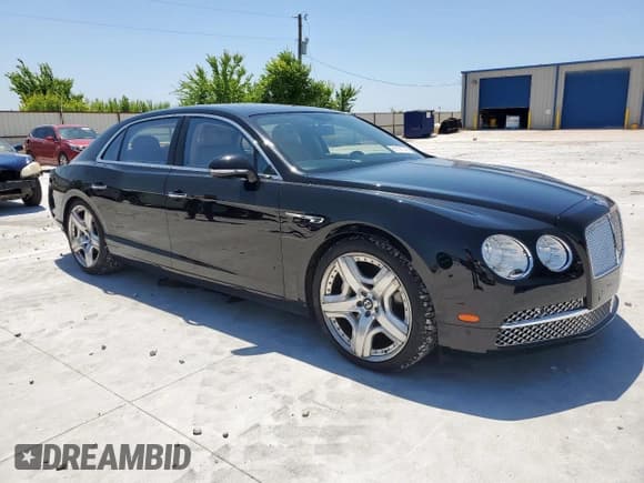 ✅ 2014 Bentley Flying Spur • VIN: SCBEC9ZA8EC088818 • Lot: 61191335. Wystawiony na Copart z przebiegiem 26 781 mil. Bezpłatny archiwum sprzedaży aukcyjnych z USA i szczegółowy raport historii pojazdu na DreamBid. Zdjęcie 4.