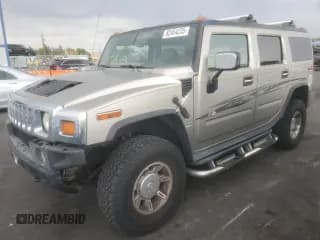 ✅ 2004 Hummer H2 • VIN: 5GRGN23U54H100434 • Лот: 82454235. Опубликован ранее на Copart с пробегом 291 425 миль. Бесплатный доступ к архиву аукционных продаж из США и подробный отчёт об истории автомобиля на DreamBid. Изображение 1.