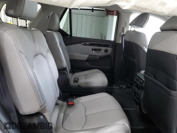 ✅ 2025 Honda Pilot Touring • VIN: 5FNYG1H73SB160805 • Lot: 82770225. Listed on Copart with 1,172 mi. Free auction sales archive from the USA and detailed vehicle history report at DreamBid. Image 11.