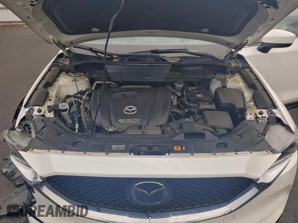 ✅ 2018 Mazda CX-5 Grand Touring • VIN: JM3KFBDM8J0348654 • Lot: 94435475. Listed on Copart with 96,864 mi. Free auction sales archive from the USA and detailed vehicle history report at DreamBid. Image 12.