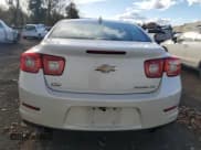 ✅ 2015 Chevrolet Malibu LTZ • VIN: 1G11G5SXXFF320528 • Lot: 90014615. Listed on Copart with 95,165 mi. Free auction sales archive from the USA and detailed vehicle history report at DreamBid. Image 6.