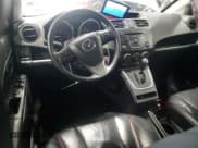 ✅ 2012 Mazda 5 Grand Touring • VIN: JM1CW2DL4C0111425 • Лот: 93205685. Опубликован ранее на Copart с пробегом 97 181 миль. Бесплатный доступ к архиву аукционных продаж из США и подробный отчёт об истории автомобиля на DreamBid. Изображение 8.