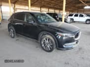 ✅ 2021 Mazda CX-5 Grand Touring • VIN: JM3KFBDM1M0490686 • Lot: 84522045. Wystawiony na Copart z przebiegiem 55 983 mil. Bezpłatny archiwum sprzedaży aukcyjnych z USA i szczegółowy raport historii pojazdu na DreamBid. Zdjęcie 4.