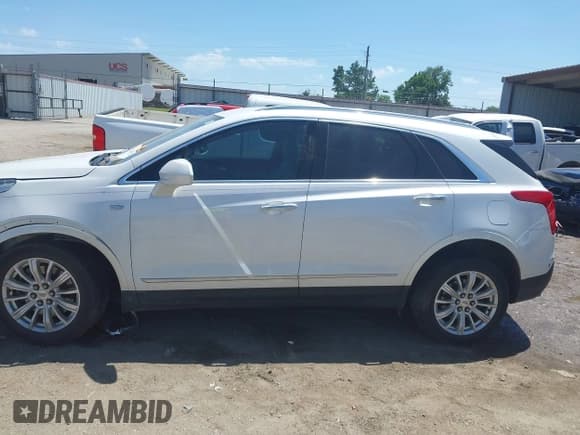 ✅ 2017 Cadillac XT5 FWD • VIN: 1GYKNARS6HZ163595 • Lot: 42289852. Listed on IAAI with 136,852 mi. Free auction sales archive from the USA and detailed vehicle history report at DreamBid. Image 14.