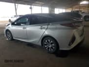 ✅ 2021 Toyota Prius XLE • VIN: JTDKAMFP8M3192080 • Lot: 93092875. Listed on Copart with 24,660 mi. Free auction sales archive from the USA and detailed vehicle history report at DreamBid. Image 2.