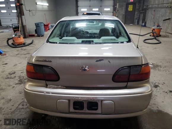 2000 Chevrolet Malibu z VIN 1G1ND52J1Y6275875, wystawiony jako Copart lot #83699264 z przebiegiem 128 288 mil mil oraz Szkoda całkowita • Salvage title. Historia ofert i sprzedaży dostępna na DreamBid. Obrazek 6.