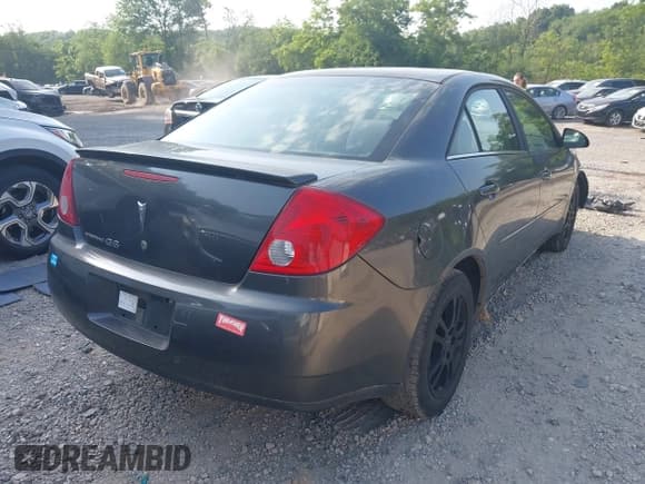 ✅ 2006 Pontiac G6 1SV • VIN: 1G2ZF55B164160326 • Lot: 42582002. Wystawiony na IAAI z przebiegiem 141 315 mil. Bezpłatny archiwum sprzedaży aukcyjnych z USA i szczegółowy raport historii pojazdu na DreamBid. Zdjęcie 4.