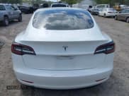 ✅ 2021 Tesla Model 3 Standard Range Plus • VIN: 5YJ3E1EA6MF052276 • Lot: 43164101. Listed on IAAI with 26,101 mi. Free auction sales archive from the USA and detailed vehicle history report at DreamBid. Image 16.