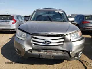 2012 Hyundai Santa Fe Limited с VIN 5XYZKDAG5CG110772, выставлен на аукционе Copart как лот 71411764 с пробегом 218 606 миль миль и Списание • Salvage title. История ставок и продаж доступна на DreamBid. Изображение 5.