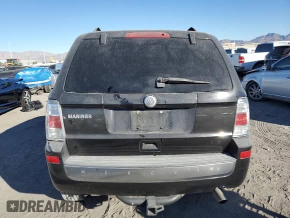 2011 Mercury Mariner z VIN 4M2CN8B76BKJ01102, wystawiony jako Copart lot #88304515 z przebiegiem 109 684 mil mil oraz Szkoda całkowita • Salvage title. Historia ofert i sprzedaży dostępna na DreamBid. Obrazek 6.