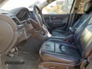 ✅ 2014 Chevrolet Traverse LT • VIN: 1GNKRHKD0EJ238484 • Lot: 81068835. Wystawiony na Copart z przebiegiem 126 249 mil. Bezpłatny archiwum sprzedaży aukcyjnych z USA i szczegółowy raport historii pojazdu na DreamBid. Zdjęcie 7.