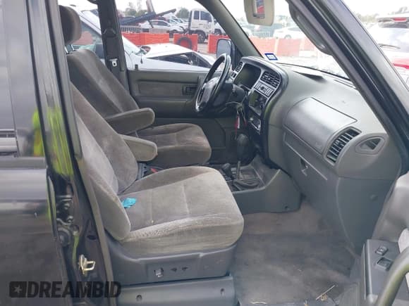 ✅ 1999 Isuzu Trooper S • VIN: JACDJ58X5X7902821 • Lot: 40762329. Wystawiony na IAAI z przebiegiem 182 773 mil. Bezpłatny archiwum sprzedaży aukcyjnych z USA i szczegółowy raport historii pojazdu na DreamBid. Zdjęcie 5.