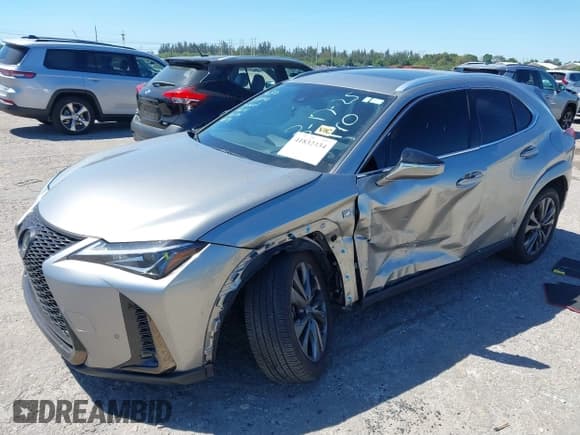 ✅ 2022 Lexus UX 200 F Sport • VIN: JTHE3JBH3N2056014 • Лот: 41832434. Опубликован ранее на IAAI с пробегом 25 693 миль. Бесплатный доступ к архиву аукционных продаж из США и подробный отчёт об истории автомобиля на DreamBid. Изображение 18.