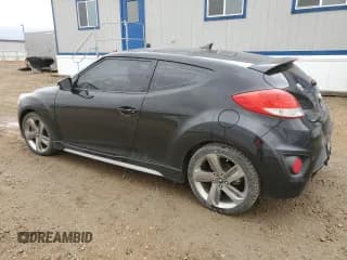 ✅ 2013 Hyundai Veloster Turbo • VIN: KMHTC6AE9DU129043 • Lot: 76062554. Wystawiony na Copart z przebiegiem 103 708 mil. Bezpłatny archiwum sprzedaży aukcyjnych z USA i szczegółowy raport historii pojazdu na DreamBid. Zdjęcie 2.