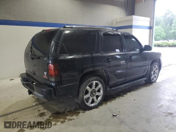 ✅ 2001 GMC Yukon Denali • VIN: 1GKEK63U41J220047 • Lot: 63429095. Wystawiony na Copart z przebiegiem Nie podano. Bezpłatny archiwum sprzedaży aukcyjnych z USA i szczegółowy raport historii pojazdu na DreamBid. Zdjęcie 3.